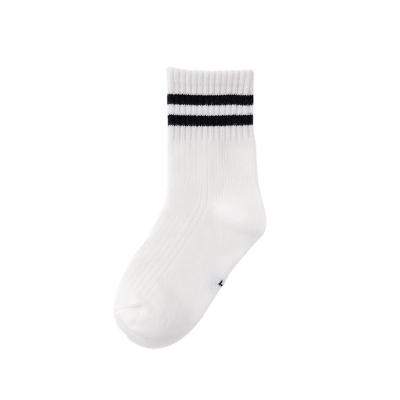 China New style autumn and winter tube solid color cotton breathable medium warm combed socks for sale