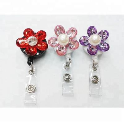 China We can OEM. new design flower yo-yo badge reel with clip for sale