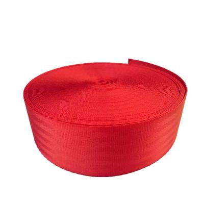 China Polyesters Yarn OEM Supplier 48cm Waterproof 2 Inch High Toughness Polyester Webbing /Nylon Sling Tape Car Seat Belt Webbing Red Color for sale