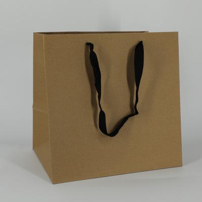 China Recyclable OEM Customized Kraft Paper Gift Craft Plain Paper Bag To Accept Custom Logo Shopping Paper Bag for sale