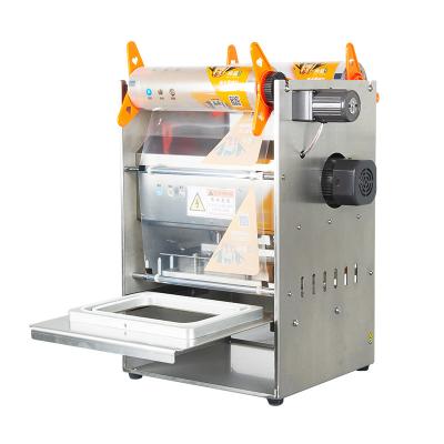 China Semi-automatic plastic food bowl sealing machine for cooked or raw food for sale