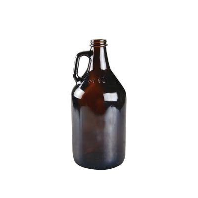 China Free sample large capacity traditional hotsale 2L amber glass shaker bottle with screw cap / amber glass beer shaker 2L beer bottle with metal LID for sale