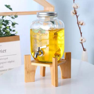 China Sustainable Glass Beverage Dispenser Glass Bottle With Metal Holder 8L Family for sale