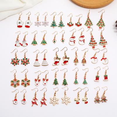 China Environmental Friendly Christmas Earrings 2021 New Product Christmas Tree Snowflake Deer Alloy Drip Earrings Wholesale for sale