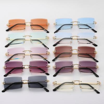 China YJ10142 2021 Fashion Sunglasses YJ10142 2021 Fashion Wholesale Rimless Women's Square Frames Mirror Shading Sun Glass Sunglasses for sale