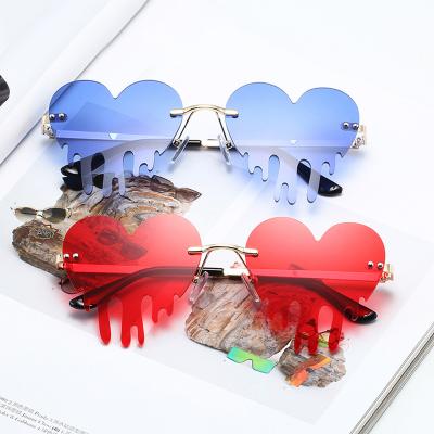 China Funny Heart Shaped Rimless Sunglasses 2021 Hot Sale Women Halloween Drip Sun Glass Party Retro Fashion Sun Glasses Yj10149 for sale