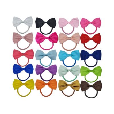 China Factory direct sales embellishment children hair accessories 3 inch same color elastic band fashion bow tie hair tie for sale