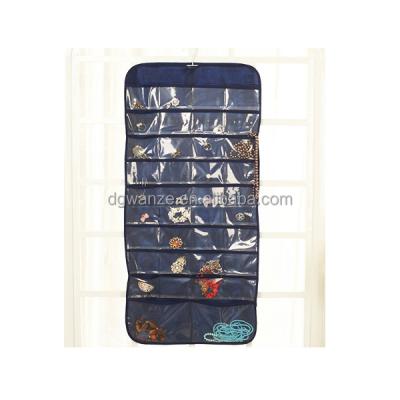 China Jewelry Store Organizer Hanging Hanging Wall Hanging Jewelry Storage Pockets Non Woven Fabric with Pockets for sale