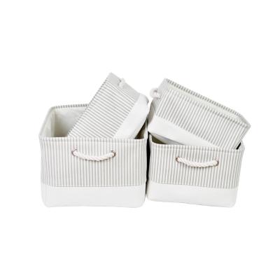 China Bohemian Lightweight Grad White Guts 4 Parts Set Folding Cloth Organizer Storage Bin Canvas Basket With Handles for sale