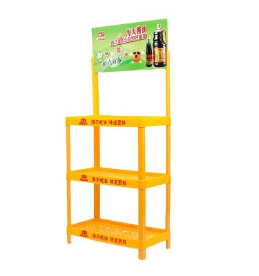 China Eco-friendly Plastic Goods Display Stands For Cooking Oil for sale