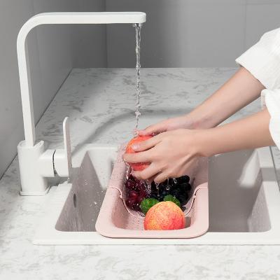 China Viable Folding Multifunctional Plastic Extendable Fruit Vegetable Dish Drying Rack Over Sink Colander Sieve Basket for sale