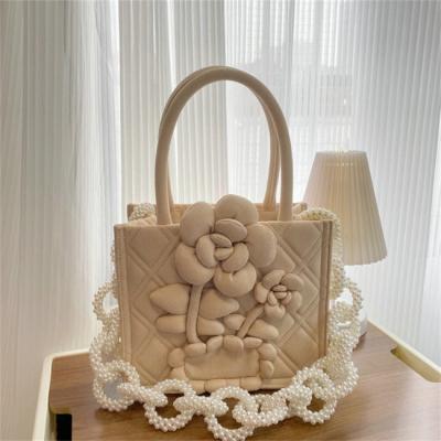 China 2022 Fashion Flower Chain Shoulder Wedding Same New Clip Fashion Clutch Handbags for sale