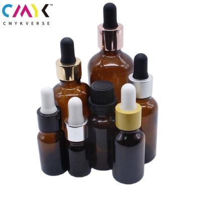 China Cosmetic Customized Essence Luxury Packaging Clear Essential Oil Glass Bottle With Plastic Dropper Glass Bottle Packaging for sale