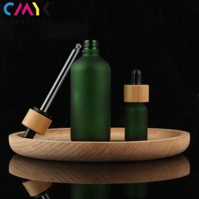 China Eco-friendly Recyclable Cosmetic Dropper Bottle Packaging Clear Glass Essential Oil Packaging Dropper Bottle With Child Protective Cap Dropper Bottle for sale