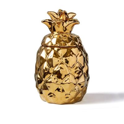 China Luxury and modern unique gold candle holder shape pineapple gold candle electroplating jar with lid for sale