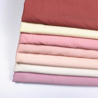 China Water Soluble Polyester Spandex Bonding Four Way Stretch Softshell Fabric for sale