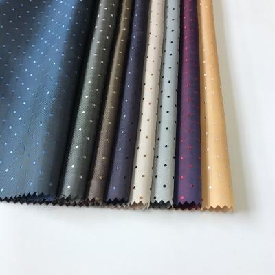 China Antistatic Hot Sale 57% Polyester 43% Viscose High Grade Striping Dot Jacquard Fabric for sale