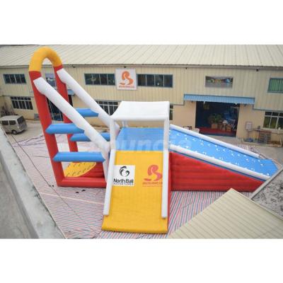 China 0.9mm durable PVC tarpaulin commercial grade inflatable floating water tower/inflatable water jumping tower with swing for sale