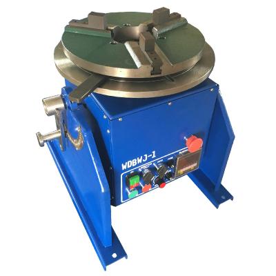 China Machinery repair shops welding positioner/electric rotating table/100KG welding tables with WP300 chuck/welding rotator with foot switch for sale