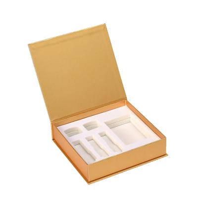 China Best Selling Custom Recyclable Essential Oil Bottle Shiny Gold Package Decorative Gift Box For Cosmetic for sale