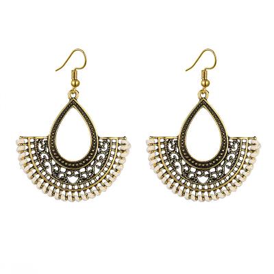 China BOHEMIA 2022 New Style Women Fashion Earrings Exaggerate Jewelry Braided Eardrop Vintage Bohemian Helix Shaped Earrings for sale