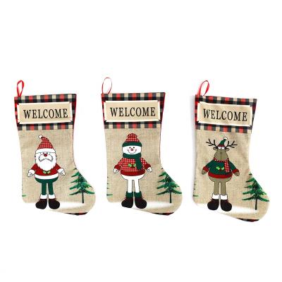 China New Year Eco-Friendly Decoration Christmas Hanging Storing Candy Bags For Kids Christmas Fireplace Hanging Ornament for sale