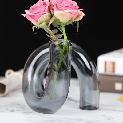 China 2022 Europe Glass Vase Bottle Candlestick Flower Vase Creative Twisted Hydroponic Pot For Home Decor for sale