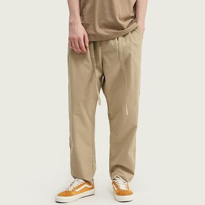 China Color Anti-pilling Casual Loose Pants Streetwear Running Trousers Pants Mens Khaki Premium Soft 100% Polyester Flat Front Plain Khaki Pants for sale