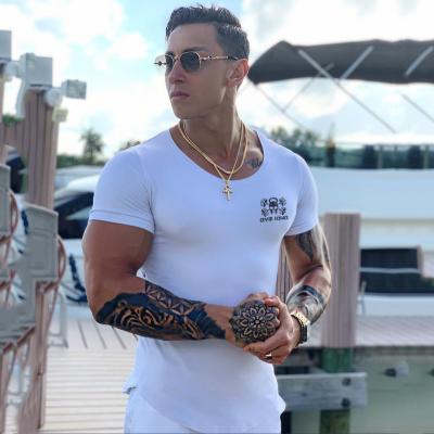 China Custom Made Cotton Anti-Static T Shirt Sport Gym Men Workout Clothes Wholesale Fitness Short Sleeve Sportswear Fitness And Yoga Wear For Adults for sale