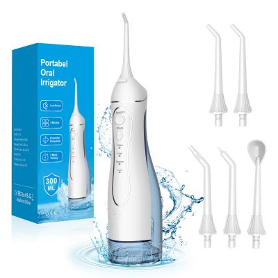 China Complete Oral Care 4-in-1 Dental Irrigator Set with Colus Water Flosser Toothbrush Hotel Usage Time 30 days for sale