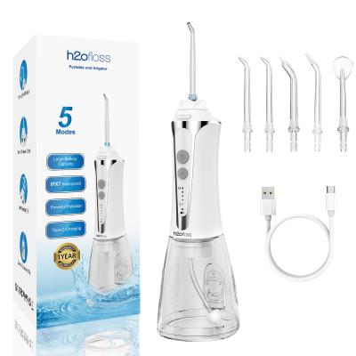 China 2024 New Portable Mini Size Water Flosser Teeth Cleaning Dental for Teeth Oral Irrigator 4 Nozzles Water Flosser Electric Dental for sale