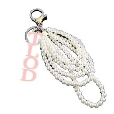 China Classic Tone Key Ring Purse Candy Greek Pink Pearl Metal Gold Letters TLOD Key Chain for sale