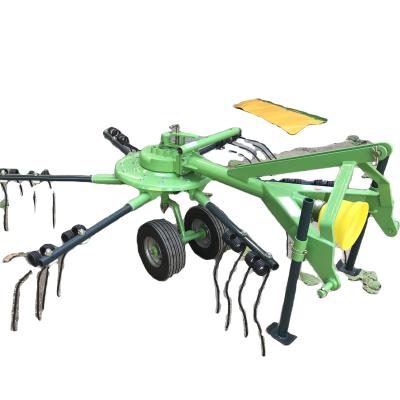 China Farms Equipment Rotary Hay Rake Grass Weeding Machine Forage Tedder Driven By Tractor PTO for sale