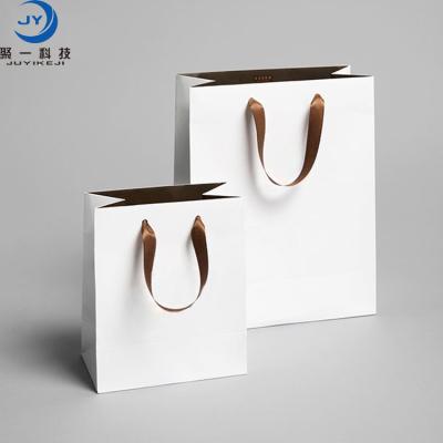 China Recyclable Custom Logo Print Wholesale Grocery White Brown Packaging Paper Gift Bag With Handle Industrial Item Outer Packaging for sale