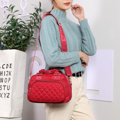 China Girls Lady Handbag Wholesale Embroidered Soft Red Nylon Yarn Messenger Bag Wear Resistant Rhombus Waterproof Handbag for sale