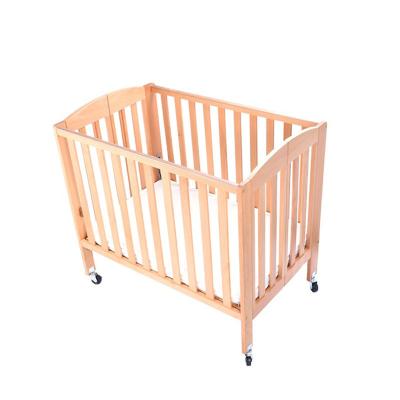 China 2 Size 4 Adjustable Baby Crib Hotel Use Five Star Baby Crib Designs Beech Wood Baby Crib Folding With Mattress for sale