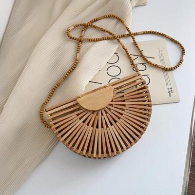 China High Quality Fashion Bamboo Straw Beach Handbags Surround Purse Woven Rattan Straw Handmade Shopping Bag for sale