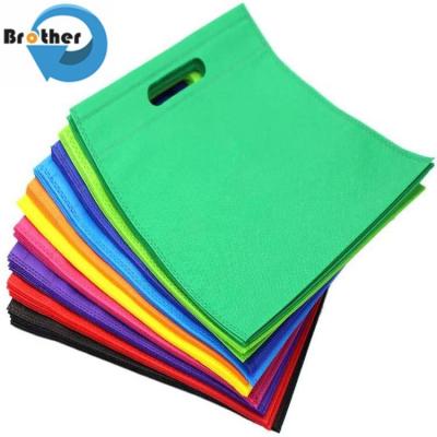 China Custom Recycle Eco PP Spunbond T-Shirt Handle Reusable Nonwoven Vest Shopping Tote Non Woven Fabric Carry Bags Te koop