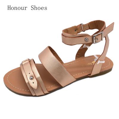 China Popular TPR Fashion Buckle Leather Innovative Flat Top Metal Decorative Sandals for sale