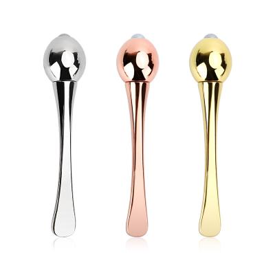 China Gold Alloy Spoon Cosmetic Anti Wrinkle Facial Eye Cream Applicator Spatulas Face Care Tool Eye Roller Massager Stick for sale