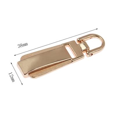 China Durable Rose Light Gold Novelty Purse 5 Metal Zipper Puller Zipper Pulls Zipper Puller Sliders in Dongguan for sale