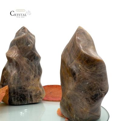 China Wholesale Europe Natural Quartz Carving Flame Shape Gray Crystal Moon Stone For Home Decor for sale