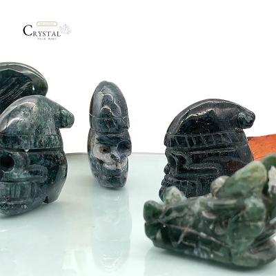 China Europe High Quality Natural Hand Carved Moss Agate Crystal Skulls For Home Pole Flattened Green Decoration for sale