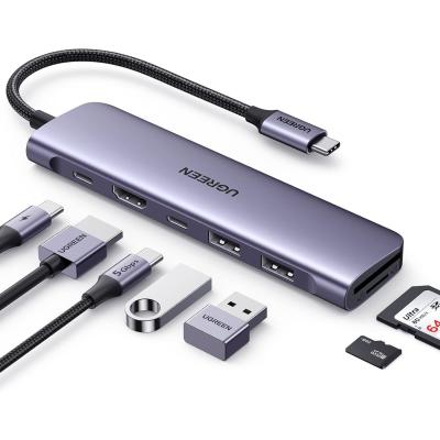 China 1071 USB C Hub para portátil 7 en 1 USB C Dongle 4K-HDMI, 100W PD Carga, USB-C y 2 USB-A Puertos de datos de 5Gbps, SD / TF en venta