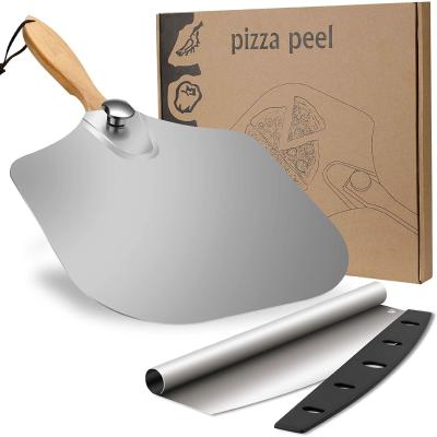 China Premium Aluminum Shovel Stocked 12 x 14 Inch Foldable Rubber Wood Handle Metal Pizza Peel Shovel With Cutter for sale