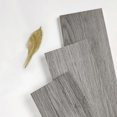 China Modern Wood Like Texture Style Porcelain Tiles Grayish Simple Wood Building Use Offices Resistance Tiles for sale