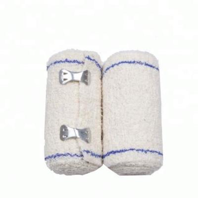 China High elastic 100% cotton bandage approved with red or blue yarn crepe bandages for sale