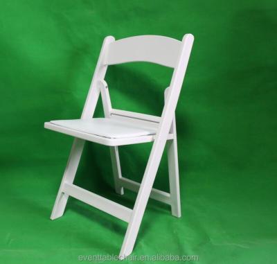 China Portable White Padded Cushion Resin PP Folding Chair for sale