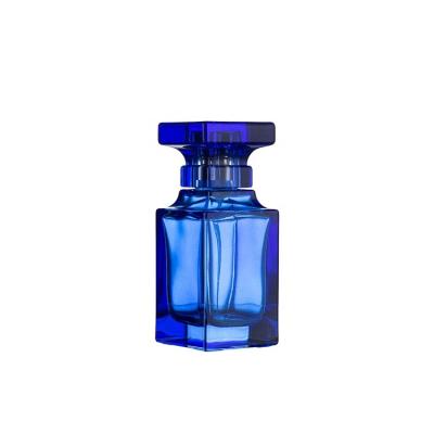 China Personal Care Factory Customization 50Ml Blue Square Rectangle Shape Spray Glass Perfume Bottle With Crown Cap for sale