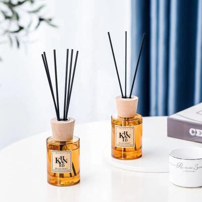 China Best Selling Recyclable Eco-friendly Reed Diffuser Set Bottle With Rattan Customize Wholesale Price Orange Glass Reed Diffuser Bottle for sale